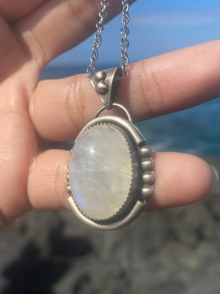 Sterling Silver Oval Rainbow Moonstone Necklace with Silver Accents